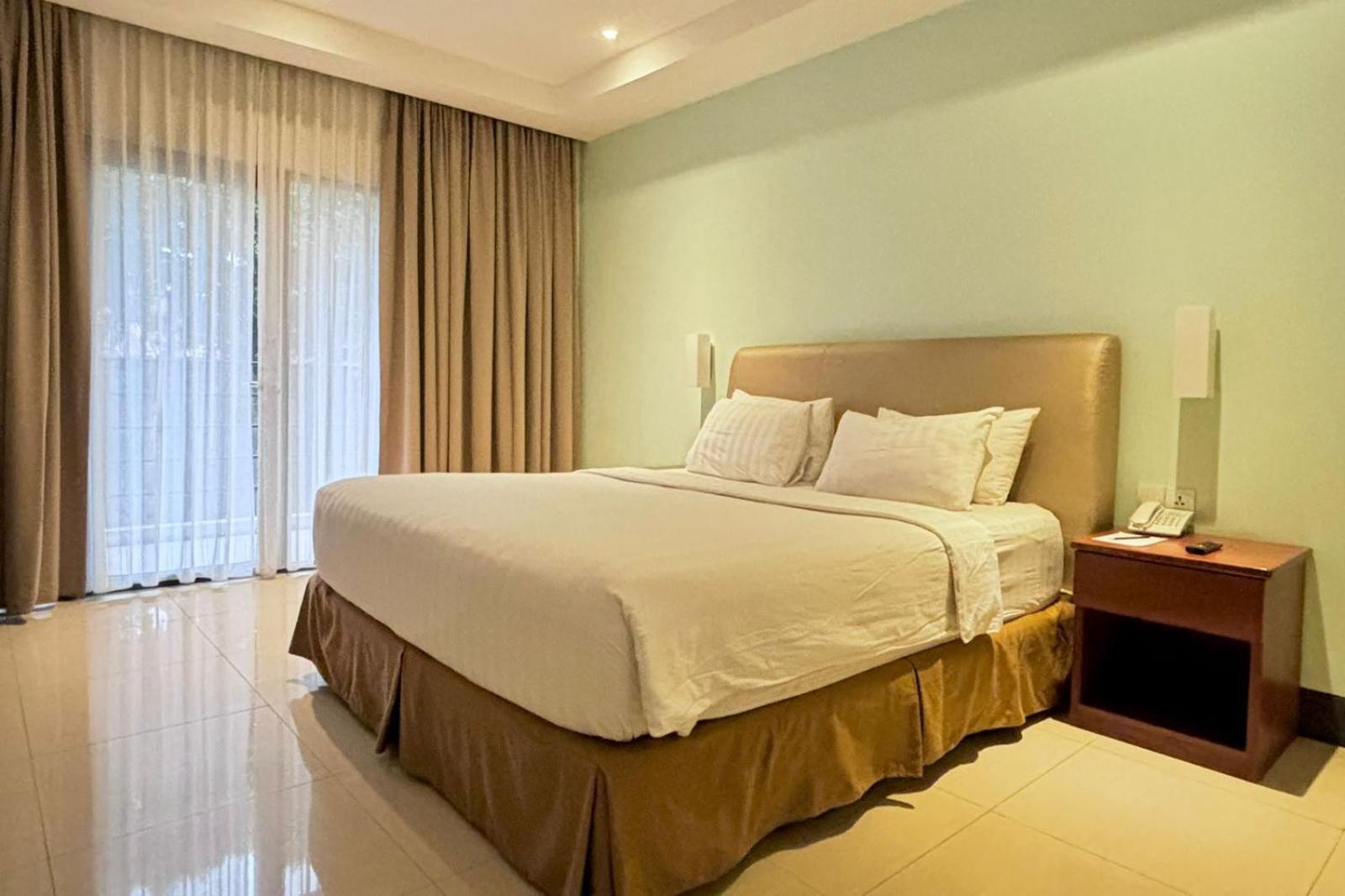 Thong'S Inn Hotel Kualanamu Medan Exterior photo